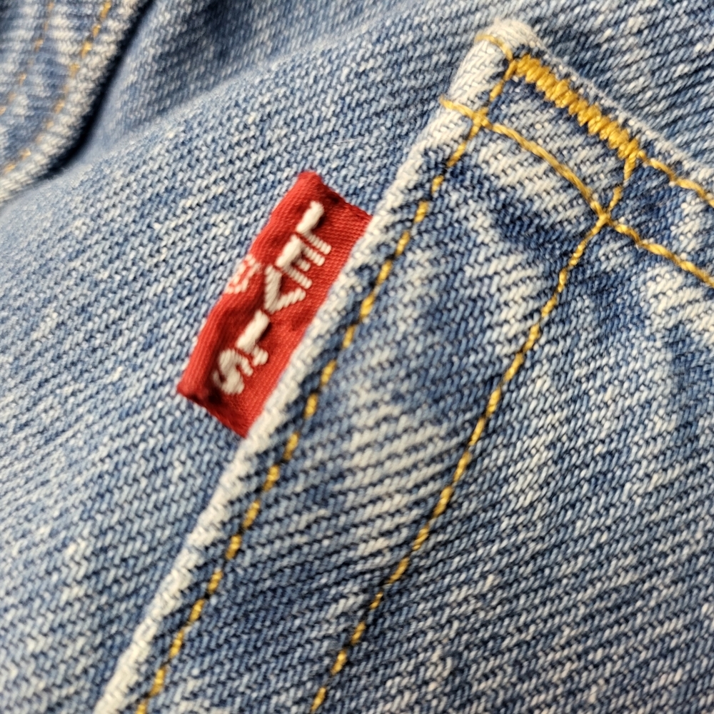 Big E Levis 501 Button Fly. Please see pics for lay flat size. 29Wx30L